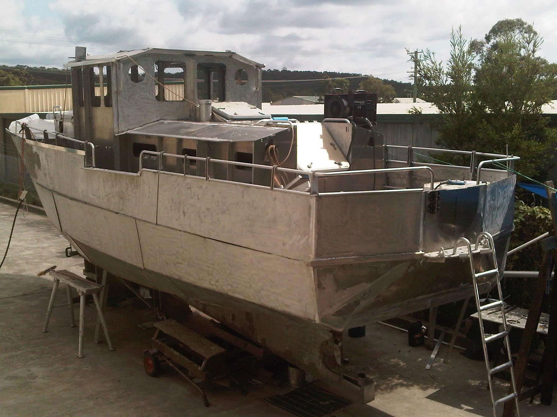 Arne boat build progressing in 2012 with Tokentools MIG Welder atop the vessel